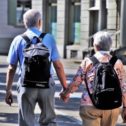 couple with backpacks exploring