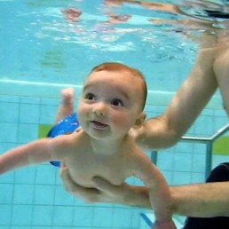 baby under water swimming