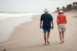 couple walking along beach