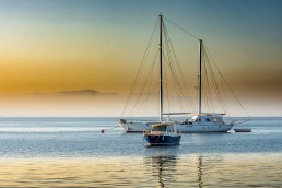 Yacht on the sea against sunset