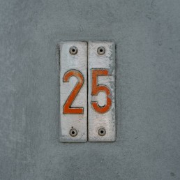 gray metal tool with 25 stickers